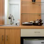 Fully Furnished With Cozy Design Studio Bassura City Apartment By Travelio