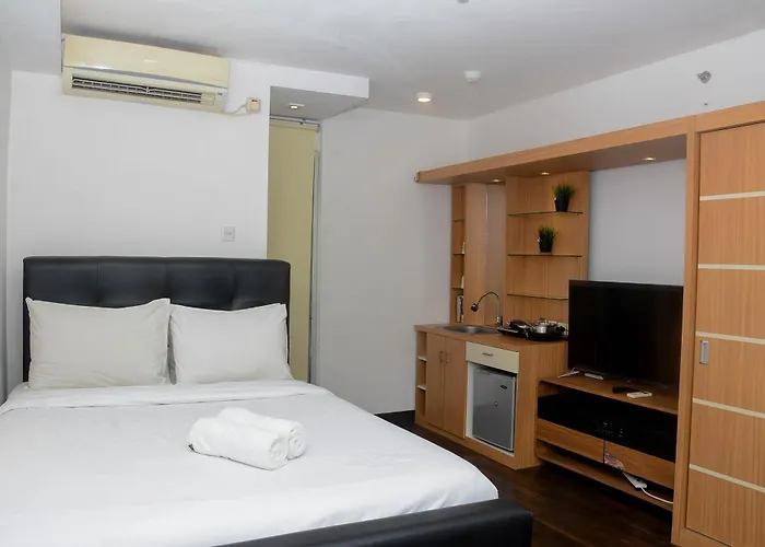 Fully Furnished With Cozy Design Studio Bassura City Apartment By Travelio